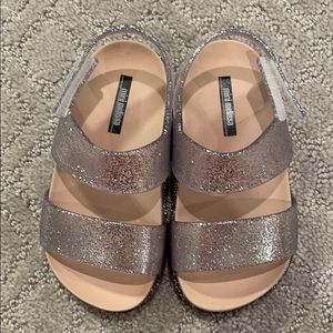 Mini Melissa’s. Never worn